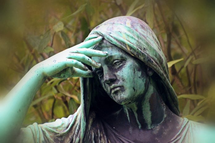 Woman statue despair