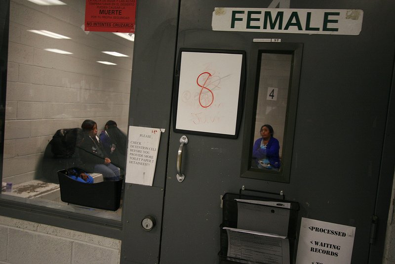 Women await deportation from the U.S. Border Patrol detention facility in Nogales, Ariz. Photo by Michel Marizco