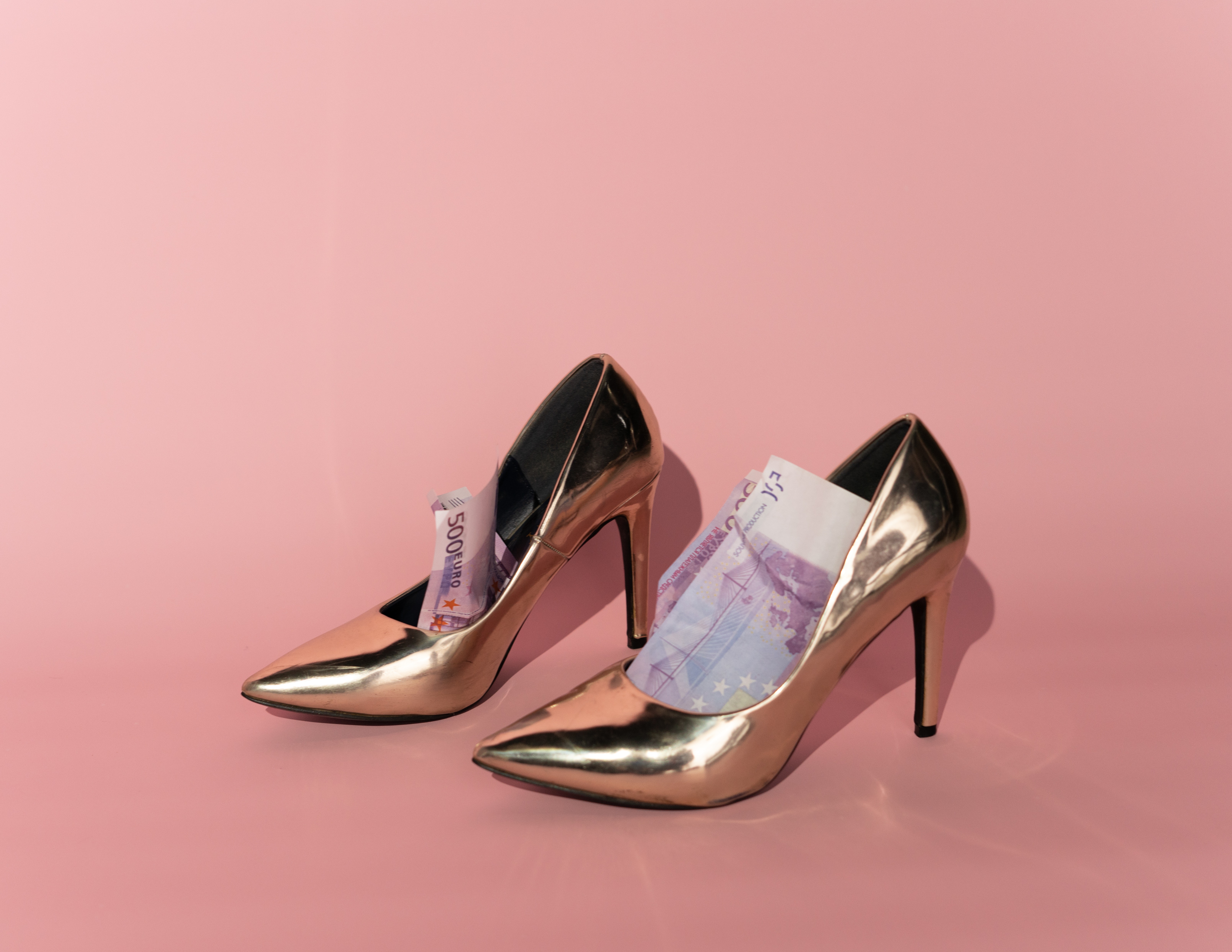 high heels with folded money inside