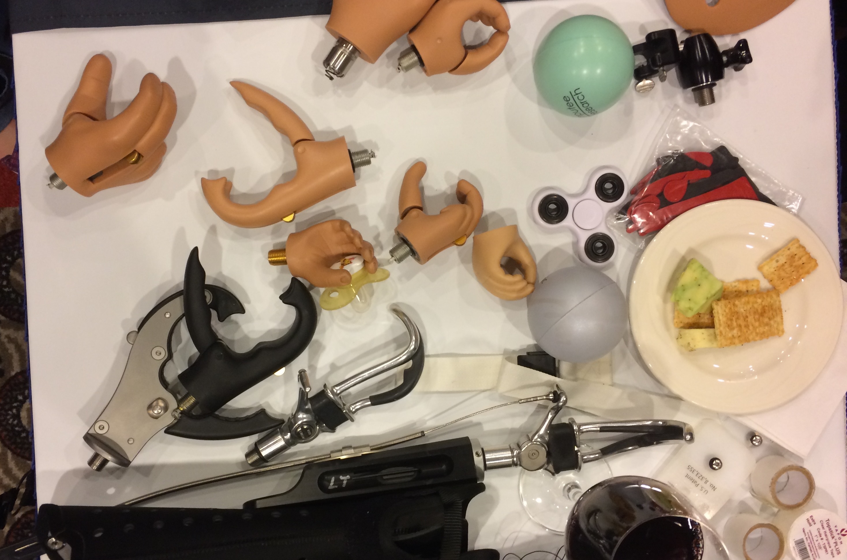 Photo depicting prosthetics on a table taken by one of the authors, Ashley Shew.