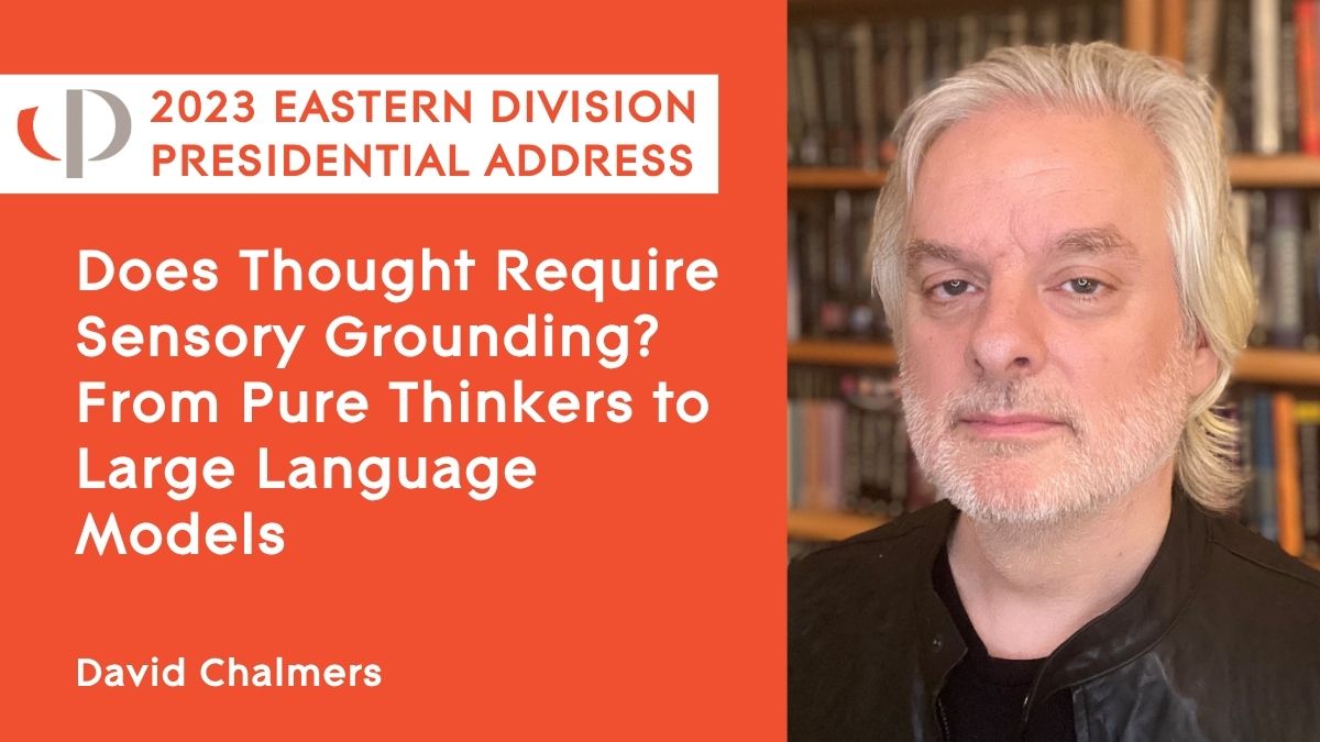 David Chalmers in front of a bookcase.